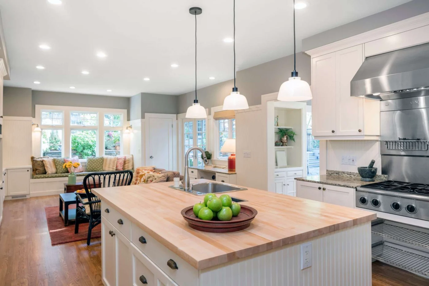 Recessed and pendant kitchen lighting shown in Baptista Electric's service flyer